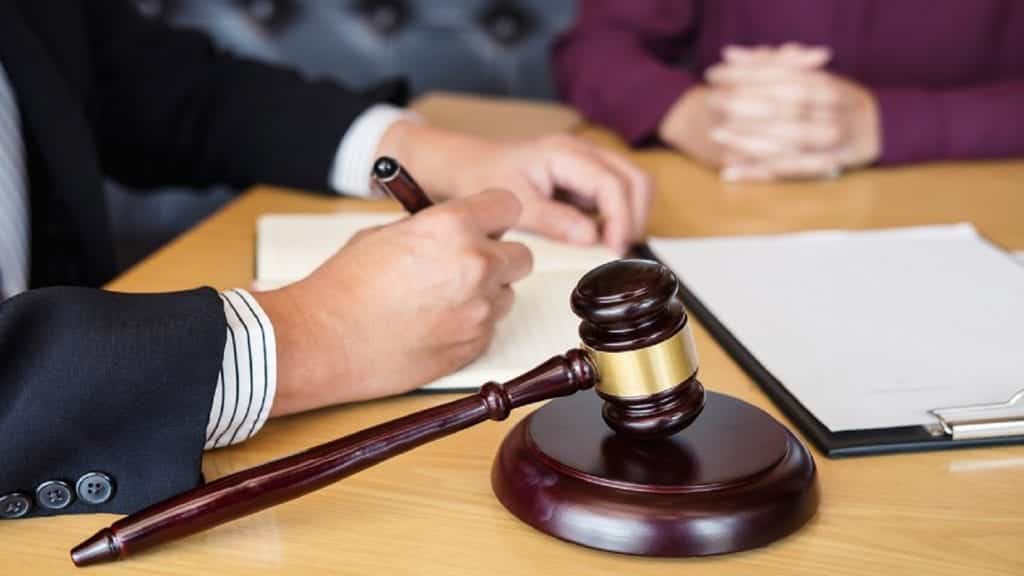 Attorney Signing Legal Document Stock Photo