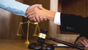 Judge Shaking Hands With An Attorney Stock Photo