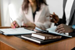 Truck accident lawyers are meeting with a client to discuss the compensation they can receive