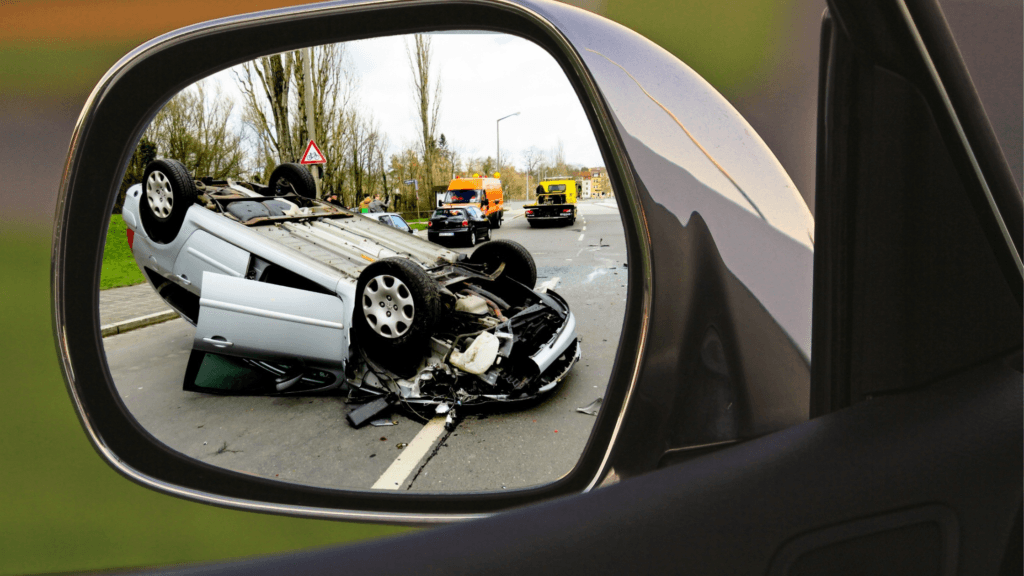 car accident in rearview mirror