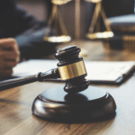 Lawyer for insurance signing paper
