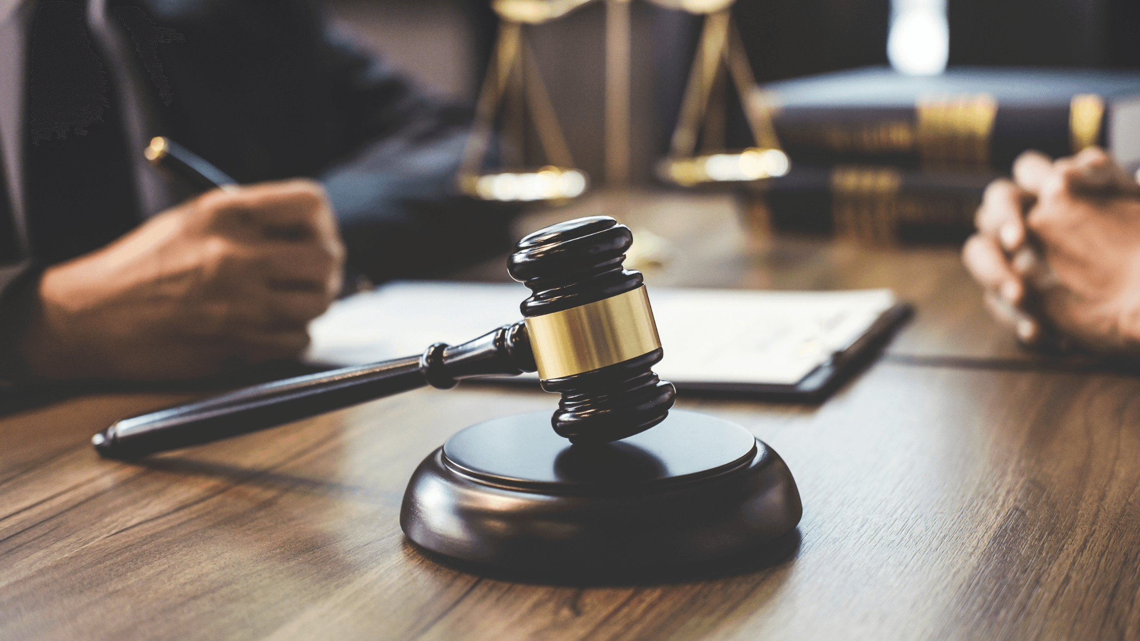 Lawyer for insurance signing paper
